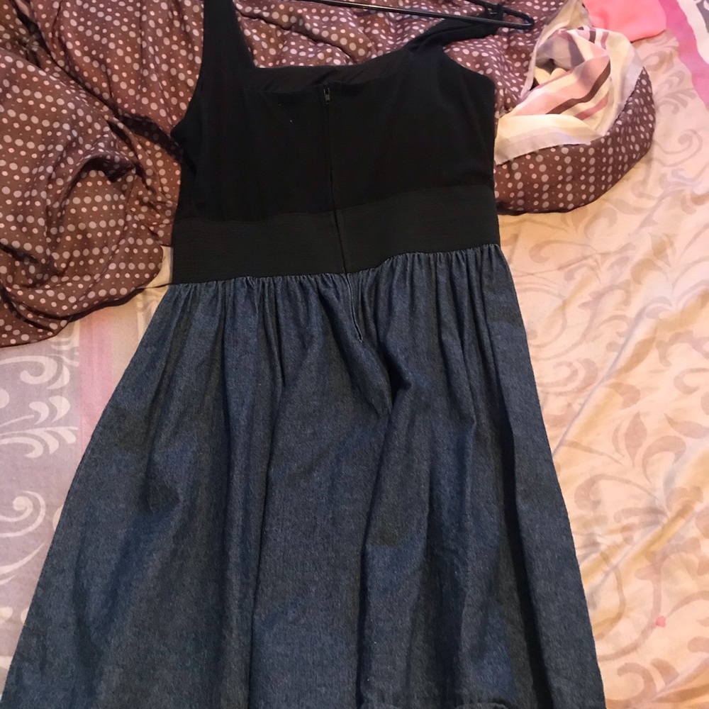 a black dress that is jean at the bottom